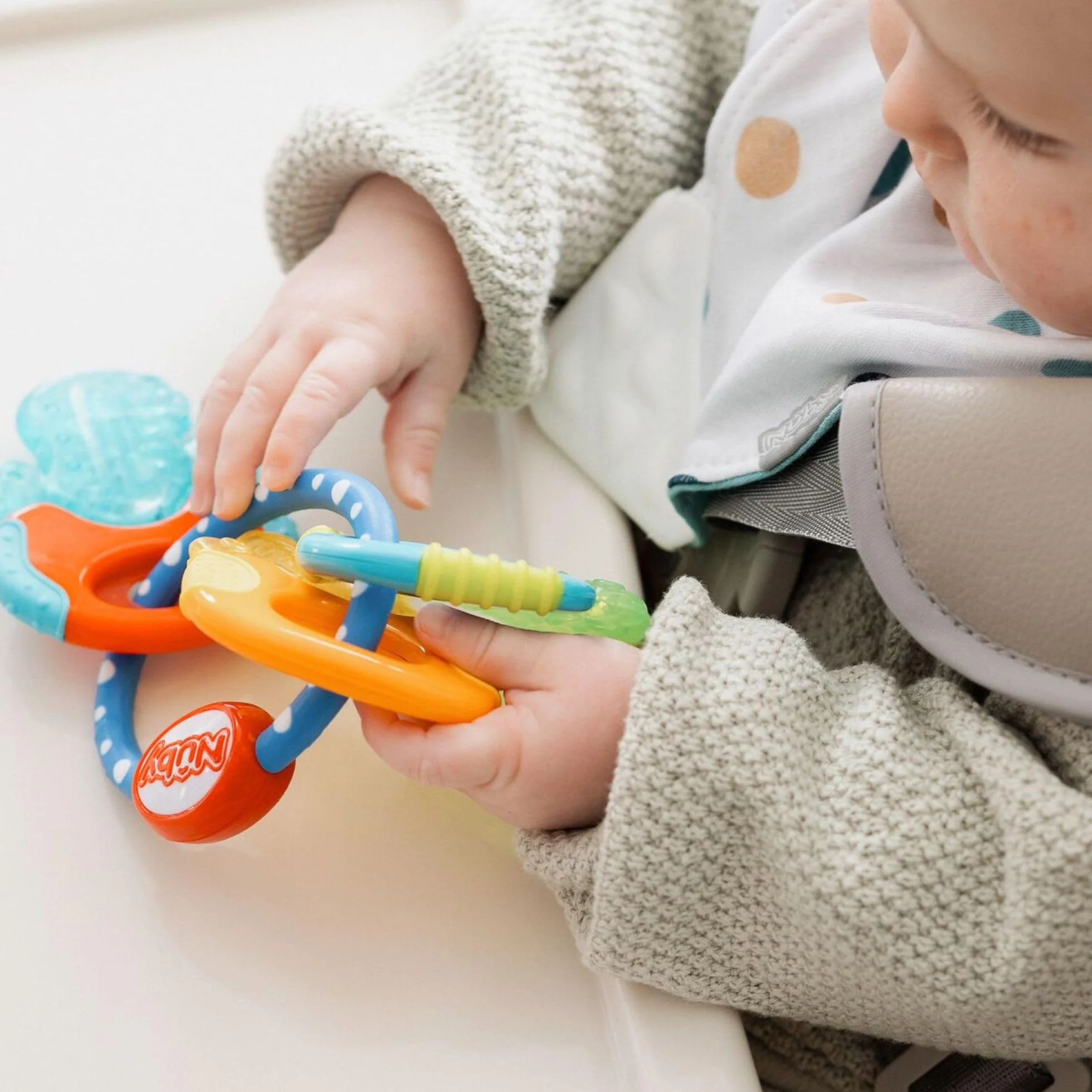 Nuby Chiavi da dentizione IcyBite Anello da dentizione in gel ICE per bambini 3+ mesi Blu