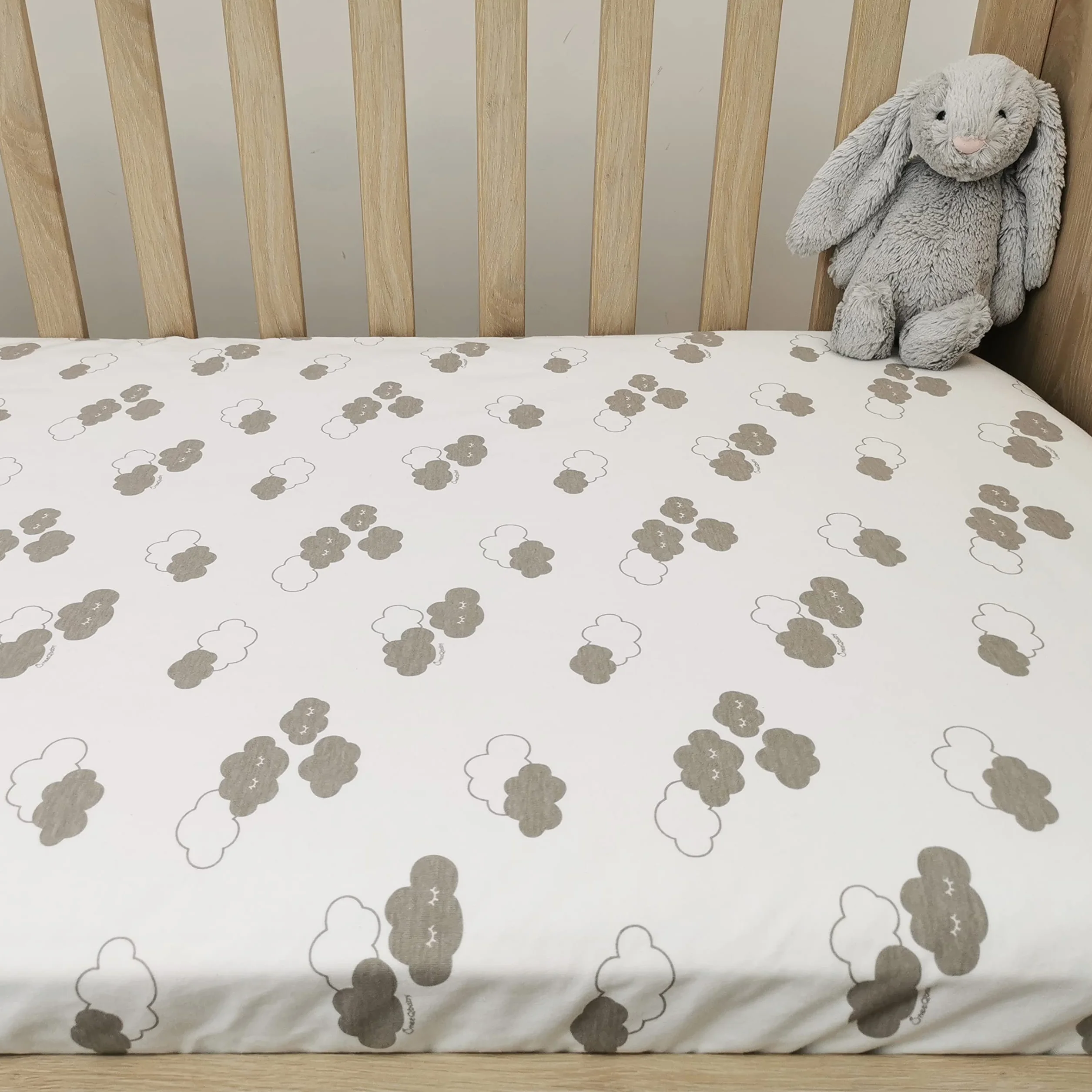ÜneeQbaby Coprimaterasso Impermeabile Cotone Biologico GOTS Oeko-TEX Classe I 70x140cm Nuvole